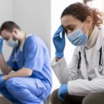 Healthcare nurse feeling stressed due to burnout
